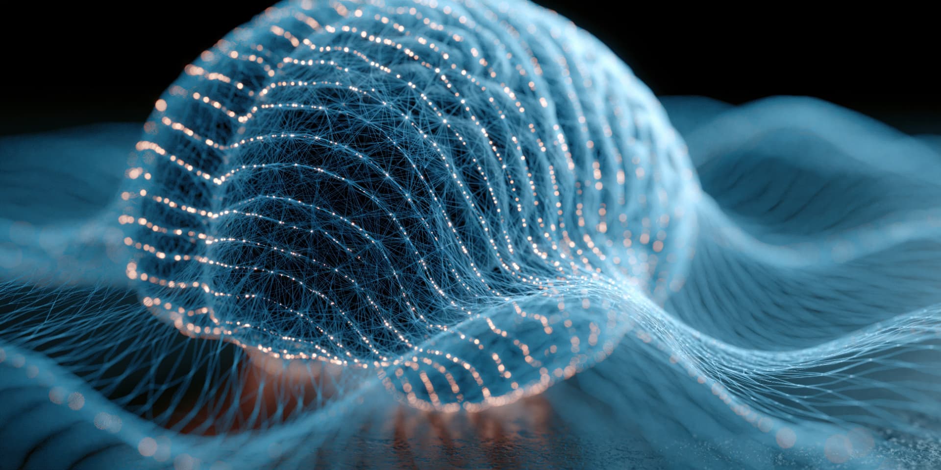 A luminous, network-like form recognizably mind-shaped rises from slow rolling waves, suggesting continuity between brain and field.